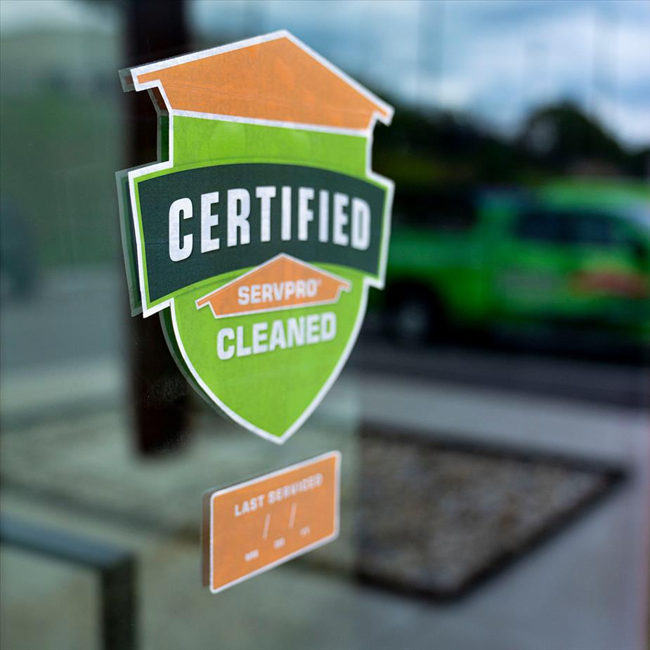 Certified: SERVPRO Cleaned sticker on commerical building window